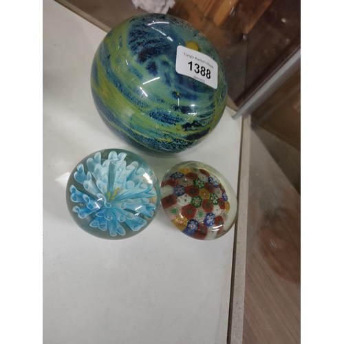 1388 - One large and two smaller beautiful colourful glass paperweights