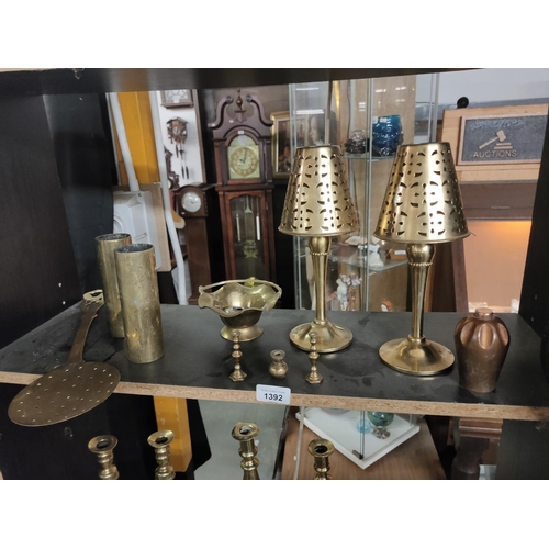 1392 - Collection of brass items including tea light holders and miniature items as well as a copper orname... 