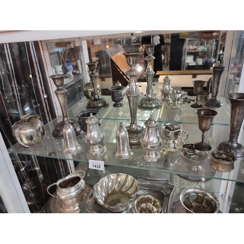 1438 - Large collection of silverplate items including candlesticks and salt and pepper pots