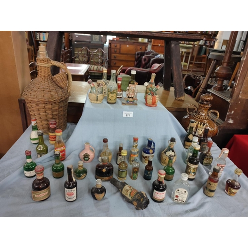 977 - Large collection of miniatures and wine carafes