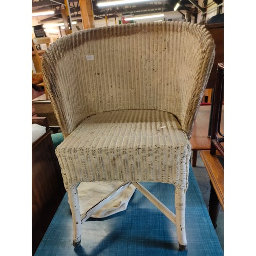 1890 - A vintage Lloyd Loom style chair painted white