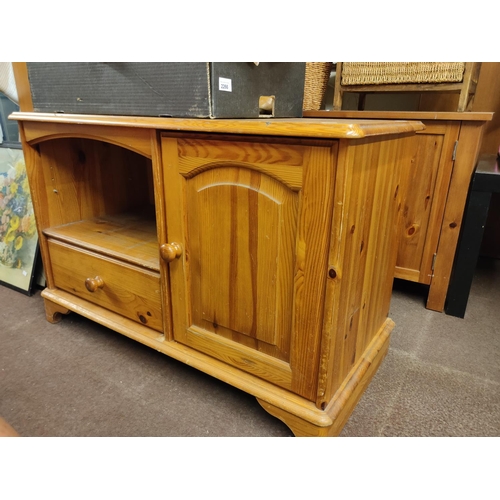 2265 - Pine wood TV stand with cupboard and drawer. Approximately 92 cm long