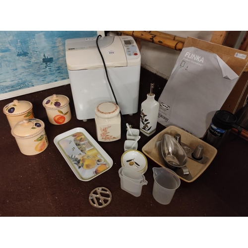 2375 - Collection of kitchen items including Bread maker, Storage jars, small tray, oil bottle and some sta... 