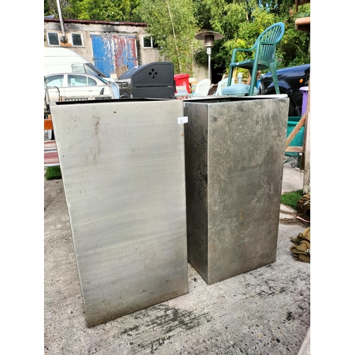 20 - Two large metal silver steel heavy planters tallest 31