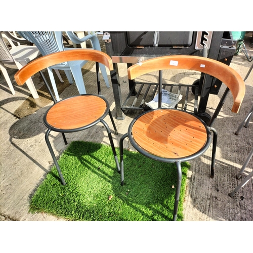 29 - Pair of wooden and metal bistro outdoor chairs