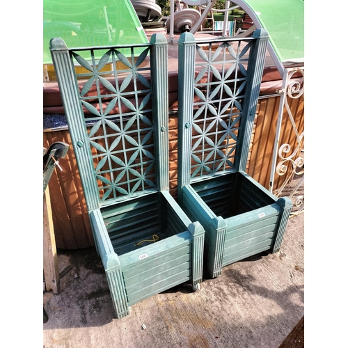 43 - A pair of plastic box planters with trellis design backs for climbing plants