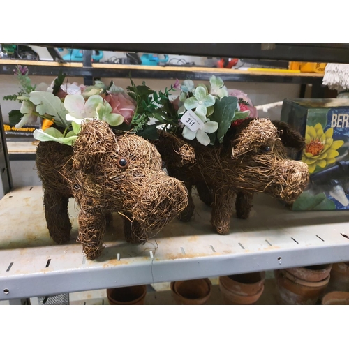 311 - TWO ELEPHANT PLANTERS WITH ARTIFICIAL FLOWERS