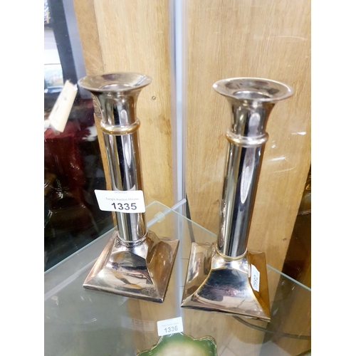 1335 - Two silver plated column candle stick holders