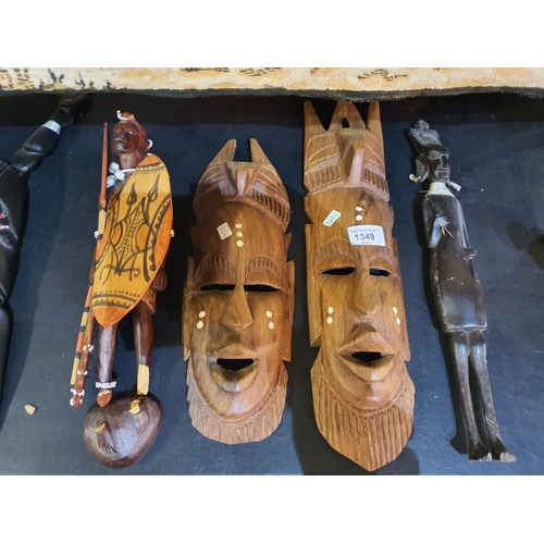 1349 - Collection of African carved masks and figures