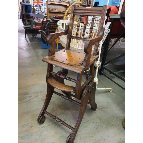 859 - An antique late victorian metamorphic high chair converts to rocking chair