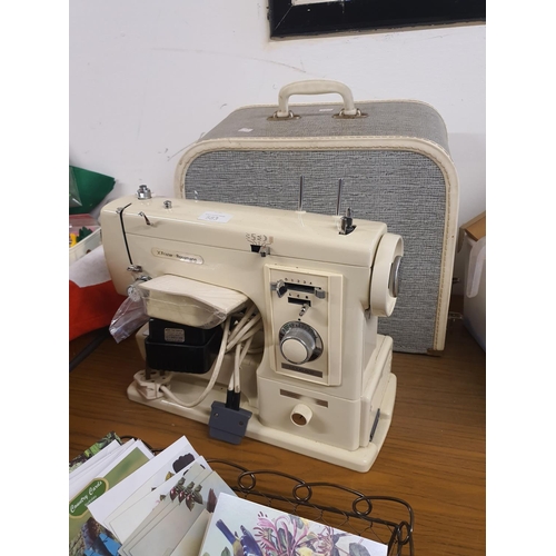 583 - Frister and Rossmann sewing machine and case