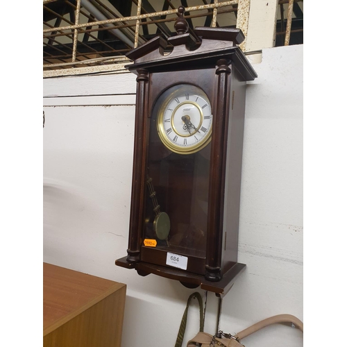 684 - Wood cased wall clock with chime