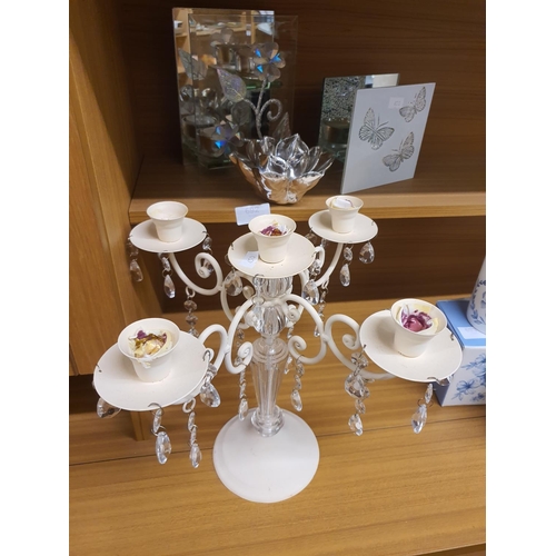 692 - Collection of ornaments including candelabra and tea light holders