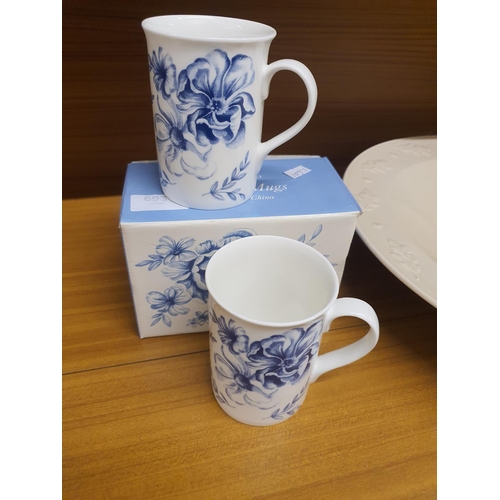 693 - Whittard of Chelsea set of two fine bone china mugs