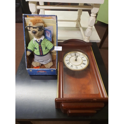 792 - Compare the market meerkat and wooden cased wall clock