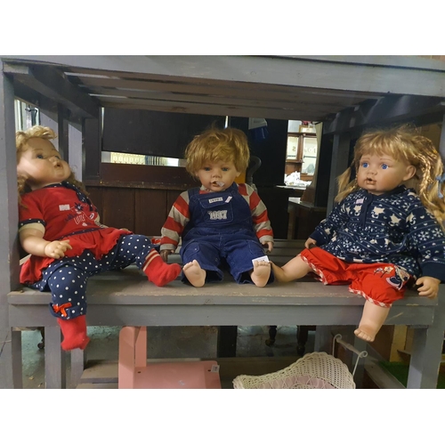 1157 - Three Leonardo Collection porcelain dolls