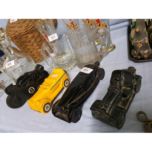 973 - Vintage ceramic Avon perfume/ aftershave bottles in the form of cars and motorbikes