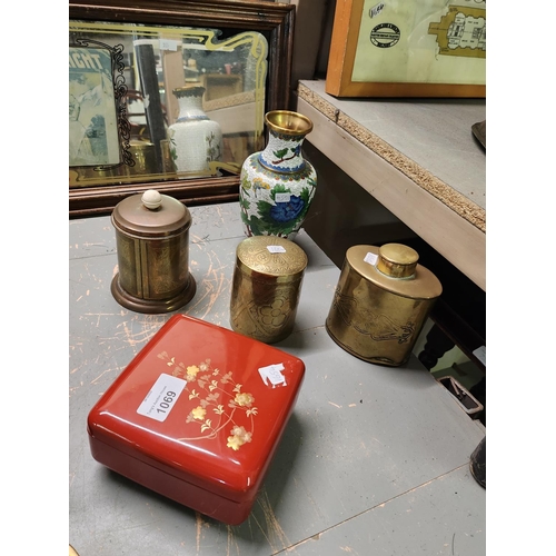 1069 - A mixed collection of brass lidded pots and vase with enamel decoration and a red lacquer box. 5 pie... 