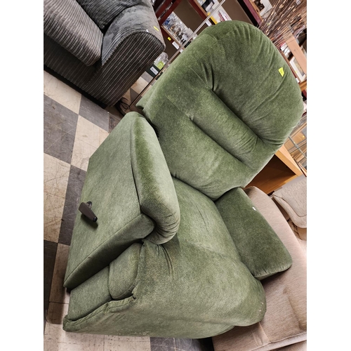 717 - Green velour reclining chair