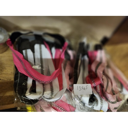 1545 - A large collection of zip style headbands white black and pink new with tags