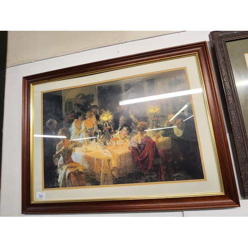 1021 - A large, framed picture of a candlelit dinner