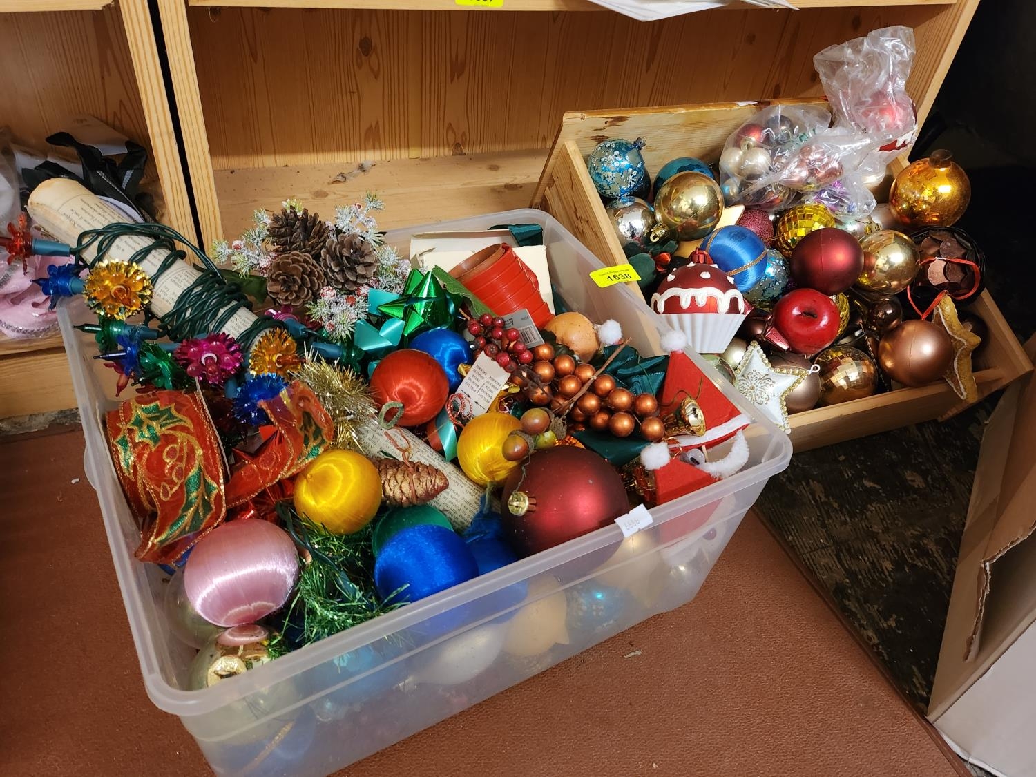 Large collection of Christmas decorations including baubles and lights