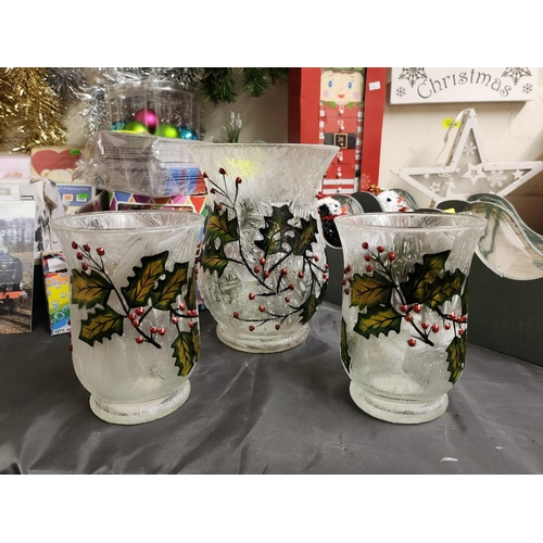 1644 - Set of three Christmas themed glass  candleholders