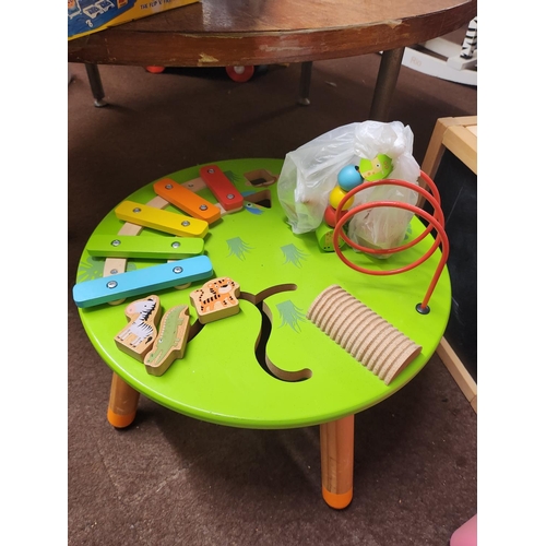 1724 - Childrens wooden activity table. In great condition