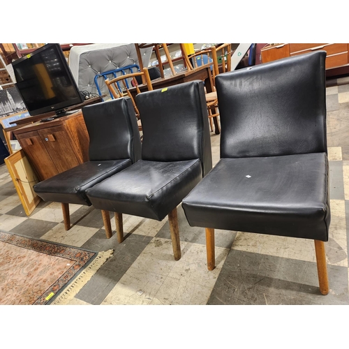 3043 - 3 black leather style chairs wooden legs