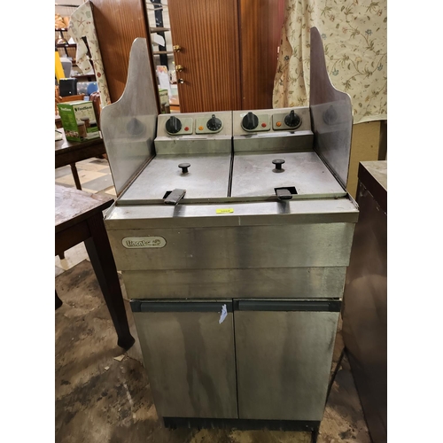 3066 - A large lincat double twin tank stainless steel catering fryer unit