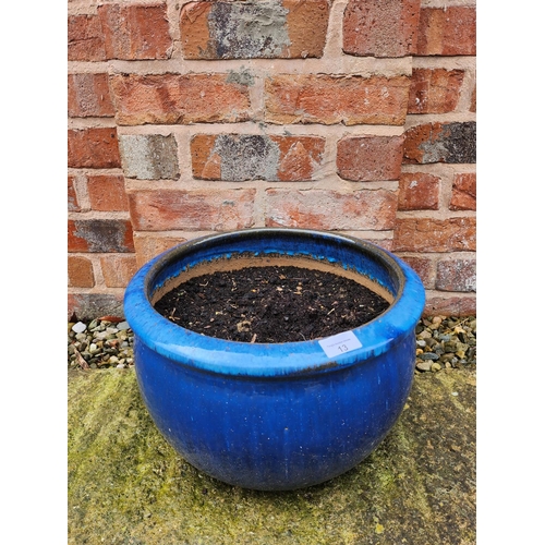 13 - Blue glazed stone planter , dirt included