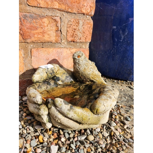 30 - 2 stoneware birdbaths in the form of cupped hands, beautifully weathered