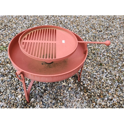 69 - Large cast iron fire pit BBQ