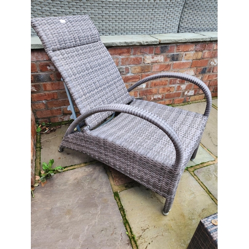 78 - Pair of Rattan reclining armchair loungers