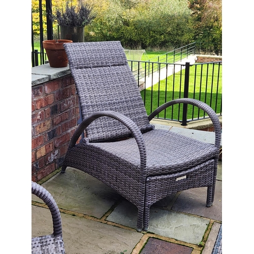 78 - Pair of Rattan reclining armchair loungers