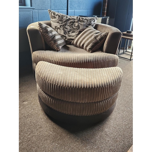 151 - Large DFS ARTHUR swivel cuddle chair with matching footstool and cushions. In great condition