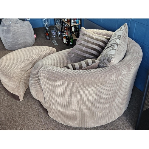 151 - Large DFS ARTHUR swivel cuddle chair with matching footstool and cushions. In great condition