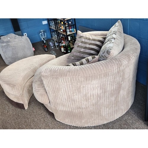 151 - Large DFS ARTHUR swivel cuddle chair with matching footstool and cushions. In great condition