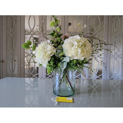 389 - Beautiful large heavy glass vase includes wonderful bouquet of artificial flowers