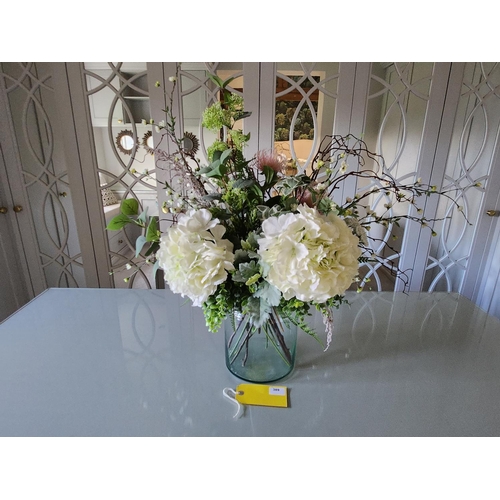 389 - Beautiful large heavy glass vase includes wonderful bouquet of artificial flowers