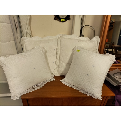 2094 - Beautiful white embroidered detailed cushions, 4 in total