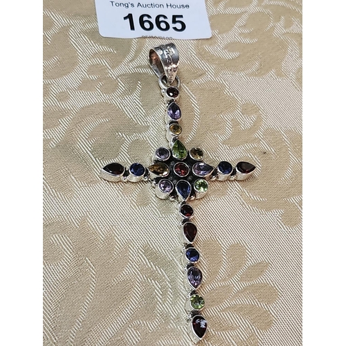 1665 - **LAST CHANCE ITEM**IMMACULATEA silver hallmarked cross with multicoloured gemstone