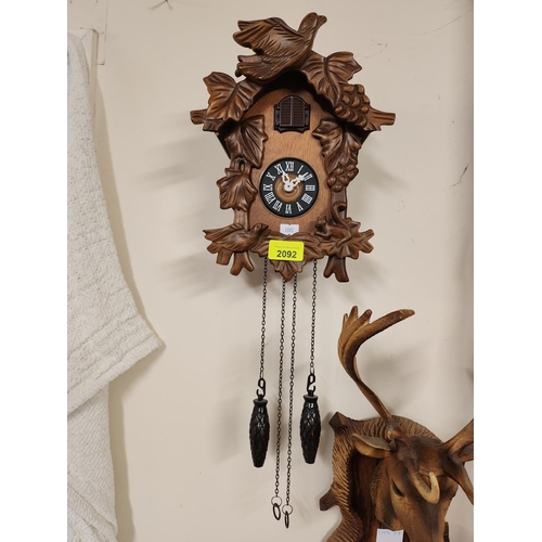 2092 - Lovely decorative cockoo clock in working order