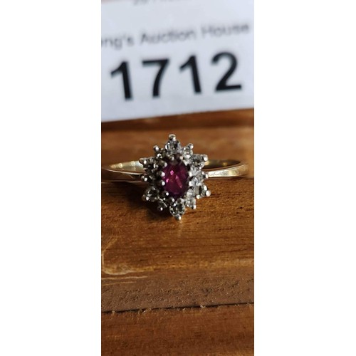 1710 - 9ct Gold Ruby and Diamond ring, 6 larger Diamonds and 6 Smaller Diamonds in perfect condition Size o