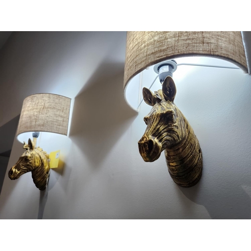 384 - Pair of gold coloured zebra head designer wall lights and shades