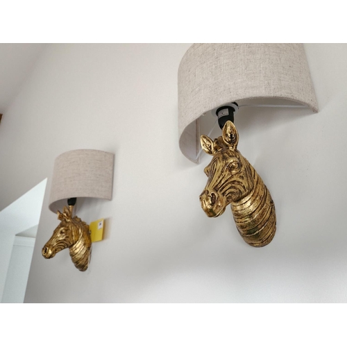 384 - Pair of gold coloured zebra head designer wall lights and shades