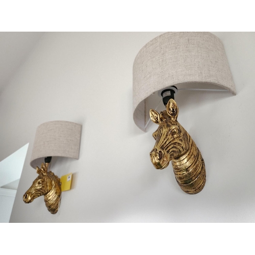 384 - Pair of gold coloured zebra head designer wall lights and shades