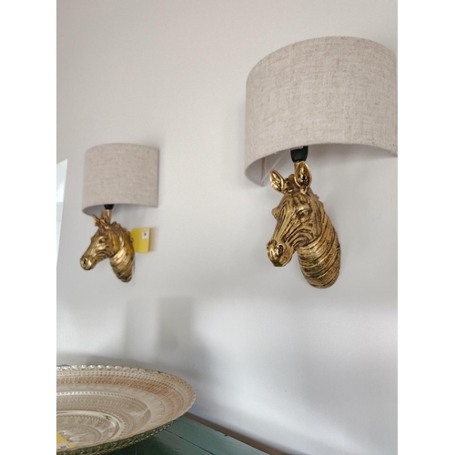 384 - Pair of gold coloured zebra head designer wall lights and shades