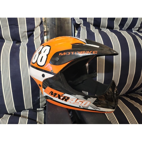 42 - Orange and black motorbike mxr 450 helmet