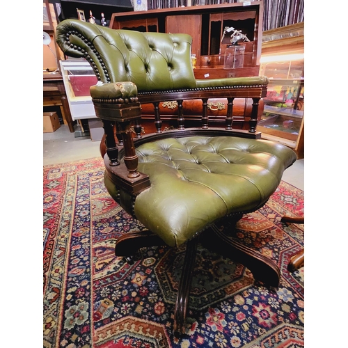 1565 - Striking antique green leather swivel office chair on casters